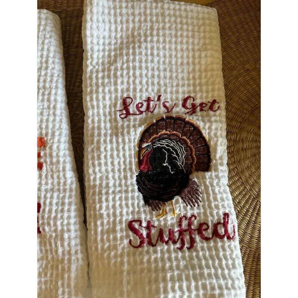 Two Thanksgiving kitchen towels